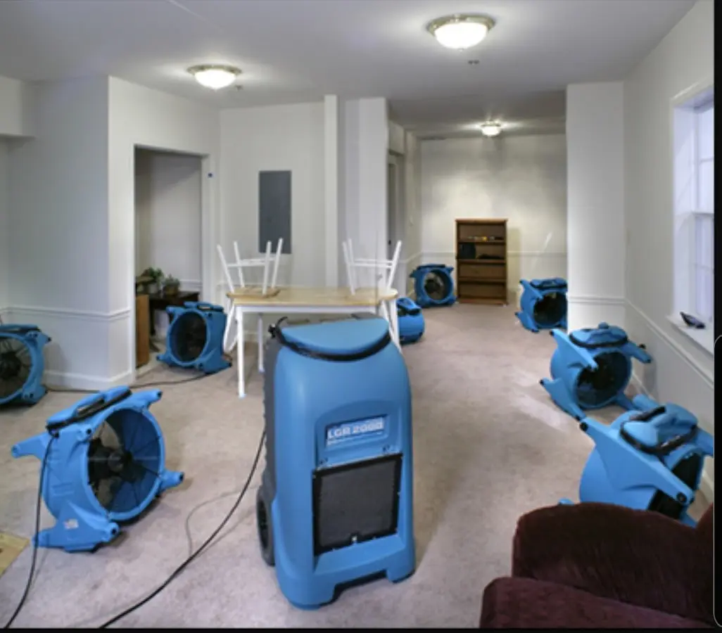 Air movers and dehumidifier setup for Water Extraction & Removal in Lackland AFB