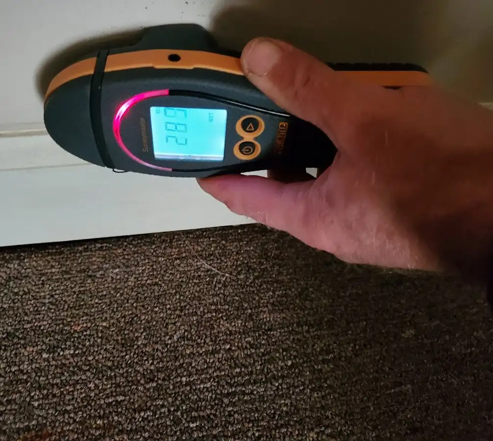 Moisture detection at baseboard during Burst Pipe Cleanup in Lackland AFB